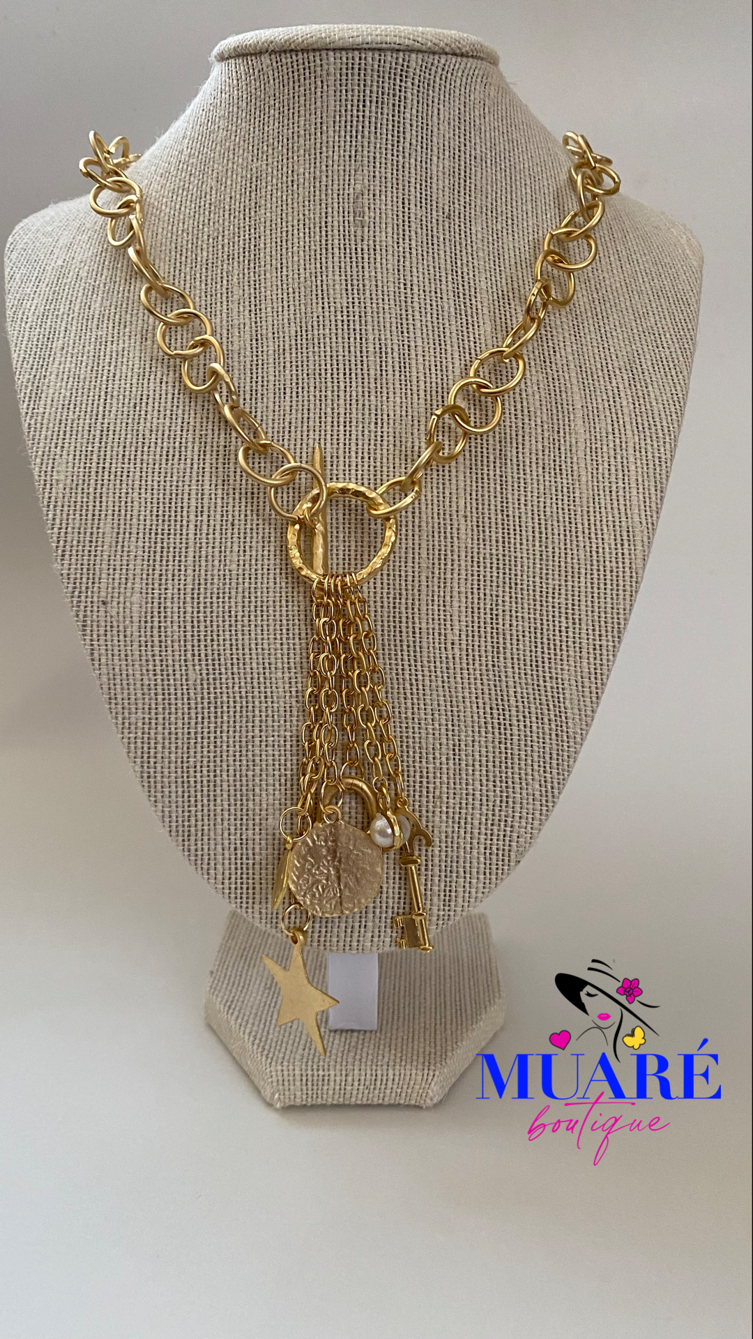 Golden necklace with charms